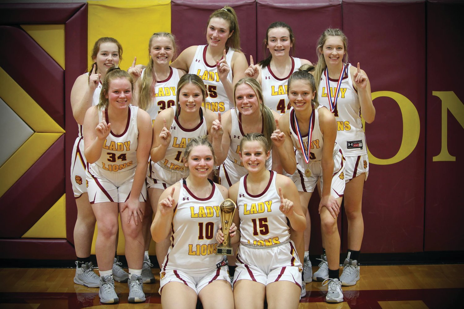 The Mansfield Lady Lions after beating Springfield Catholic by 20 points to win the Lady Lion Invitational title.